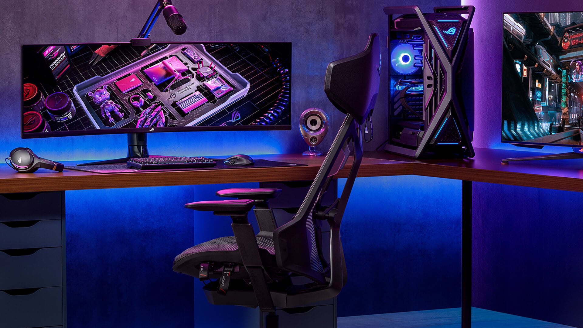 Ultrawide gaming desk setup featuring an ASUS monitor.