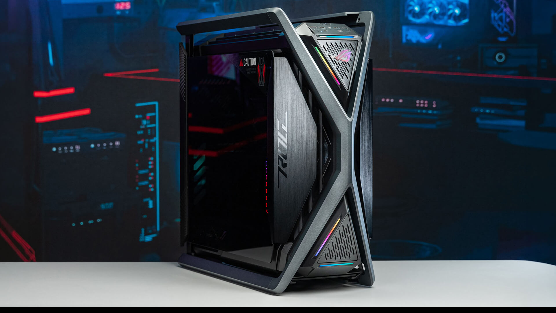 Powerful ASUS ROG gaming PC tower in a dark gaming room.