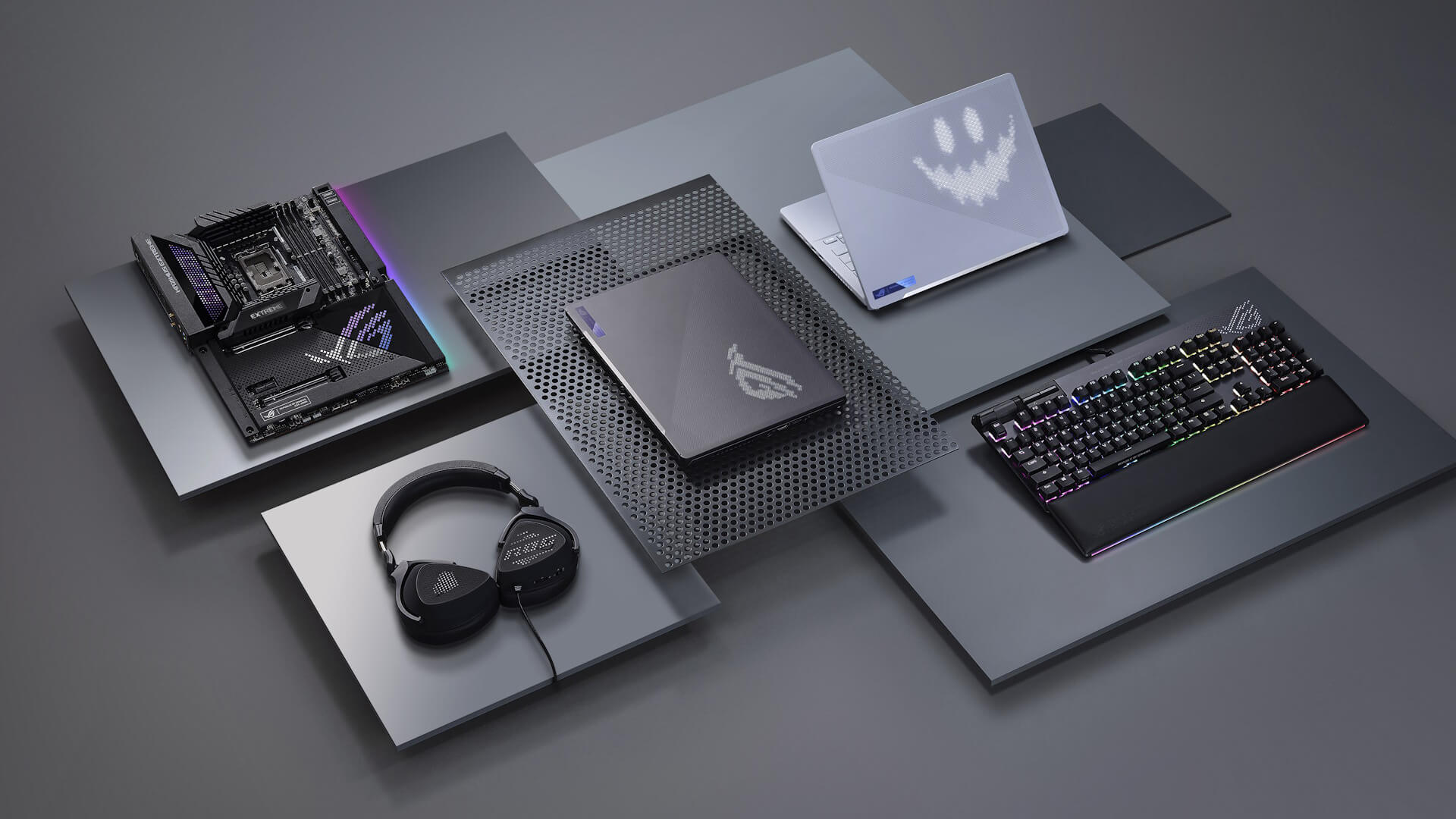ASUS ROG ecosystem with motherboard, headset, and laptops.