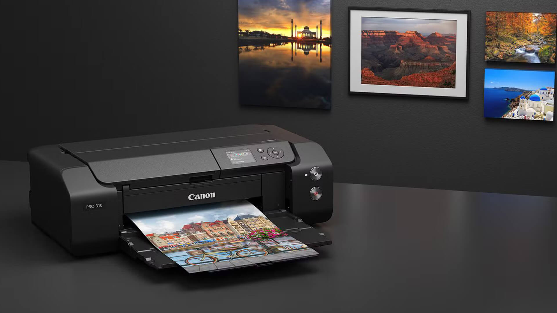 Canon printer outputting a colourful cityscape photo.