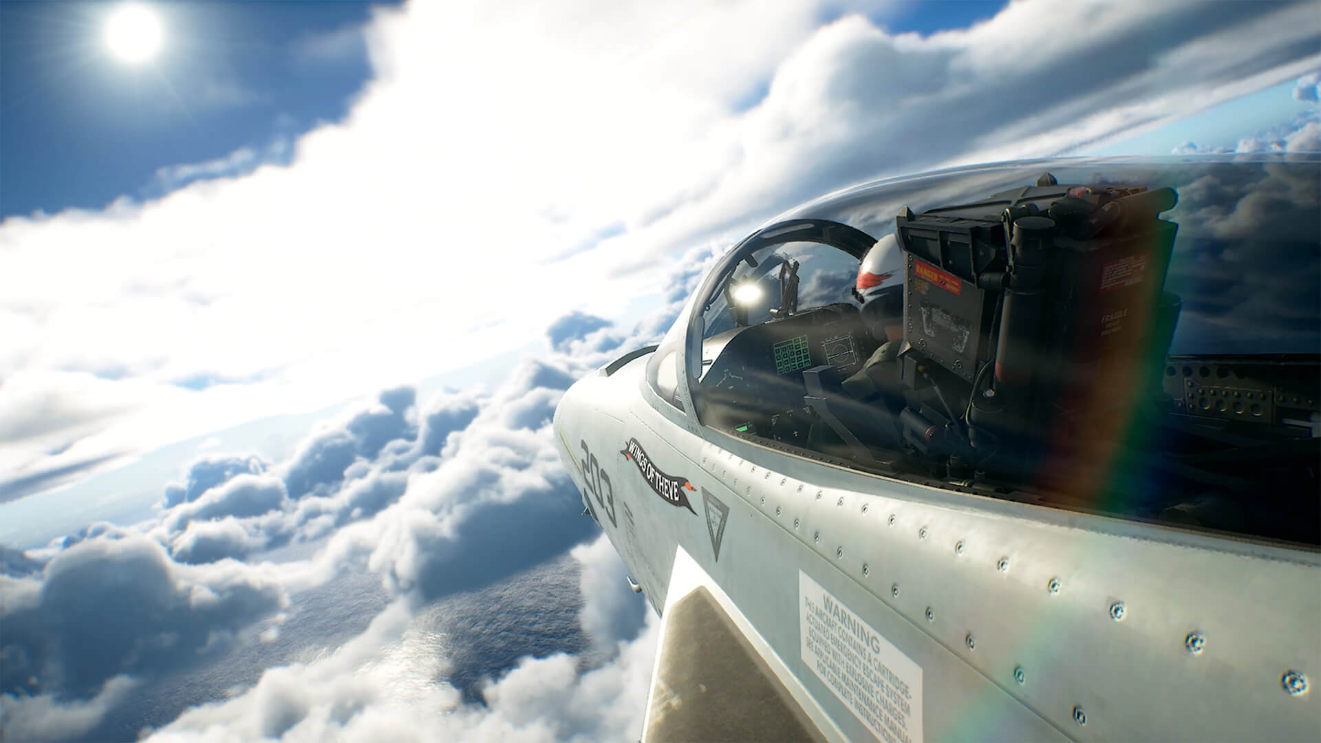 An exterior close-up view of a military fighter jet cockpit soaring high above a vast, thick layer of white clouds under a bright sun.