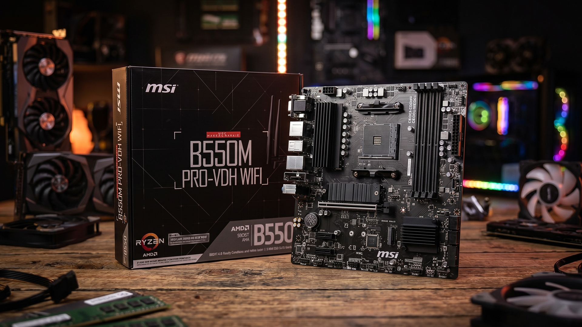 MSI B550M PRO-VDH WIFI motherboard with a CPU cooler next to its retail box.