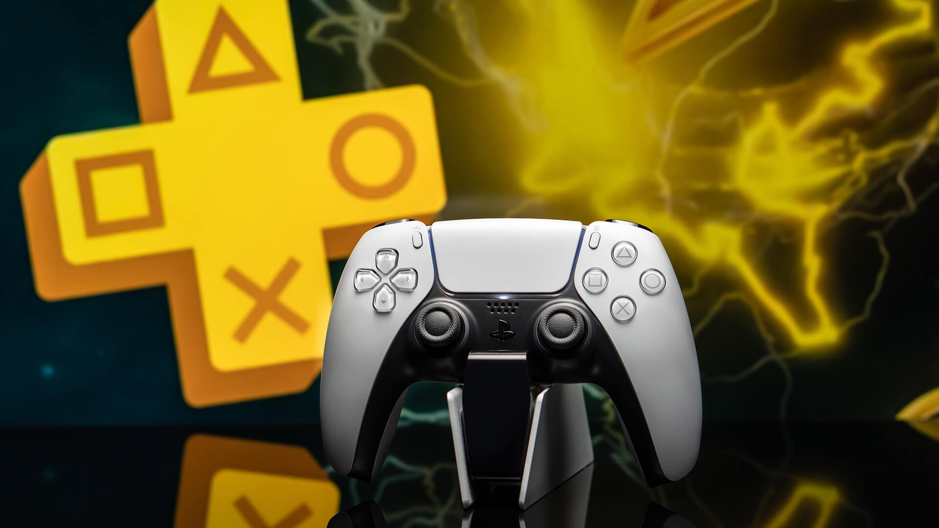 PlayStation 5 controller in front of a PlayStation Plus logo.