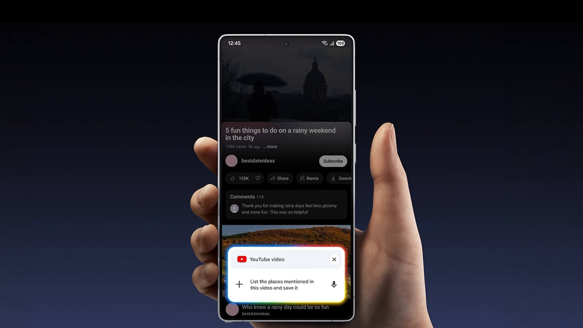 Hand holding a Galaxy S25 Ultra displaying a YouTube video.