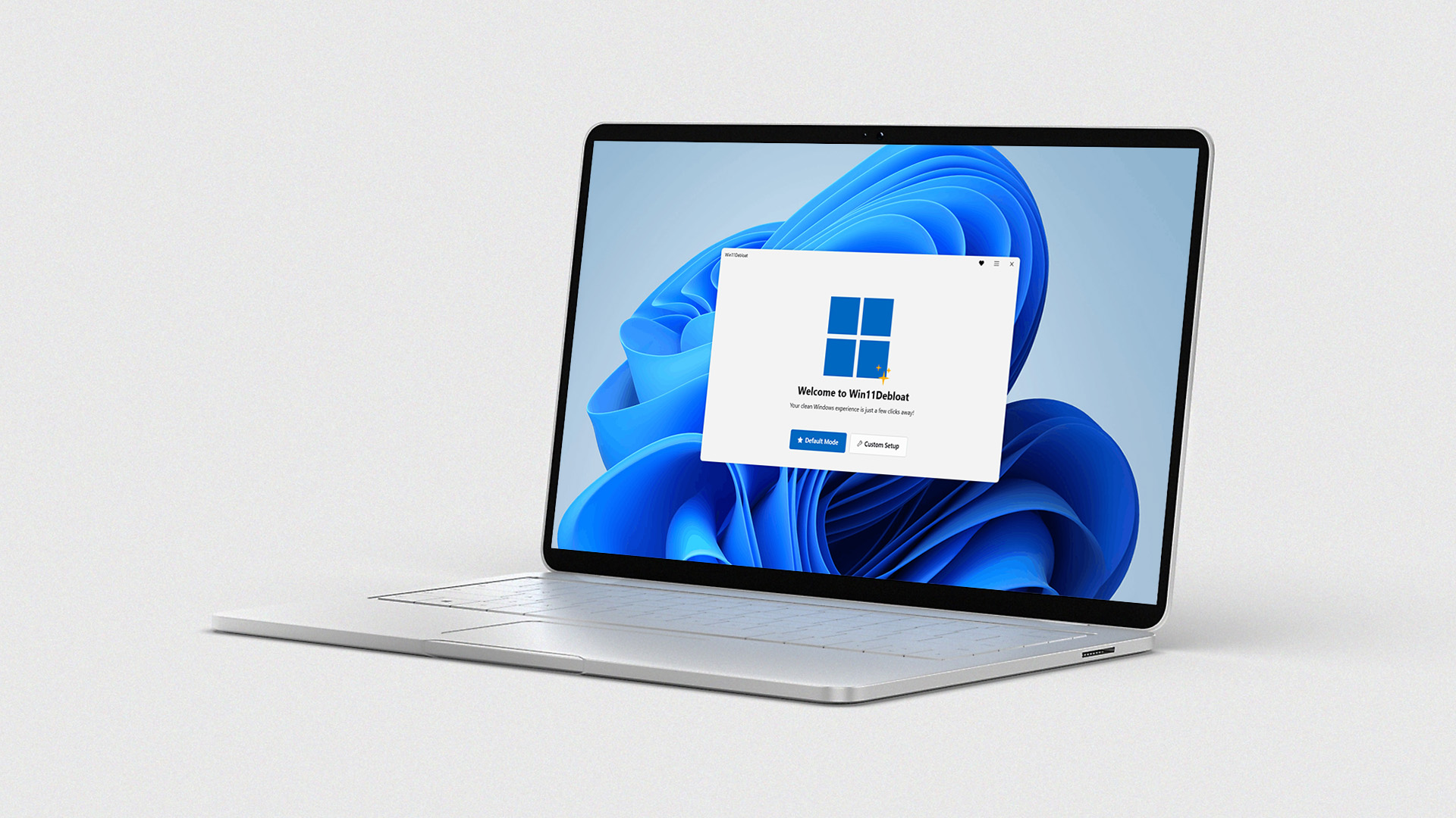 Silver laptop against a white background displaying the Win11Debloat interface.