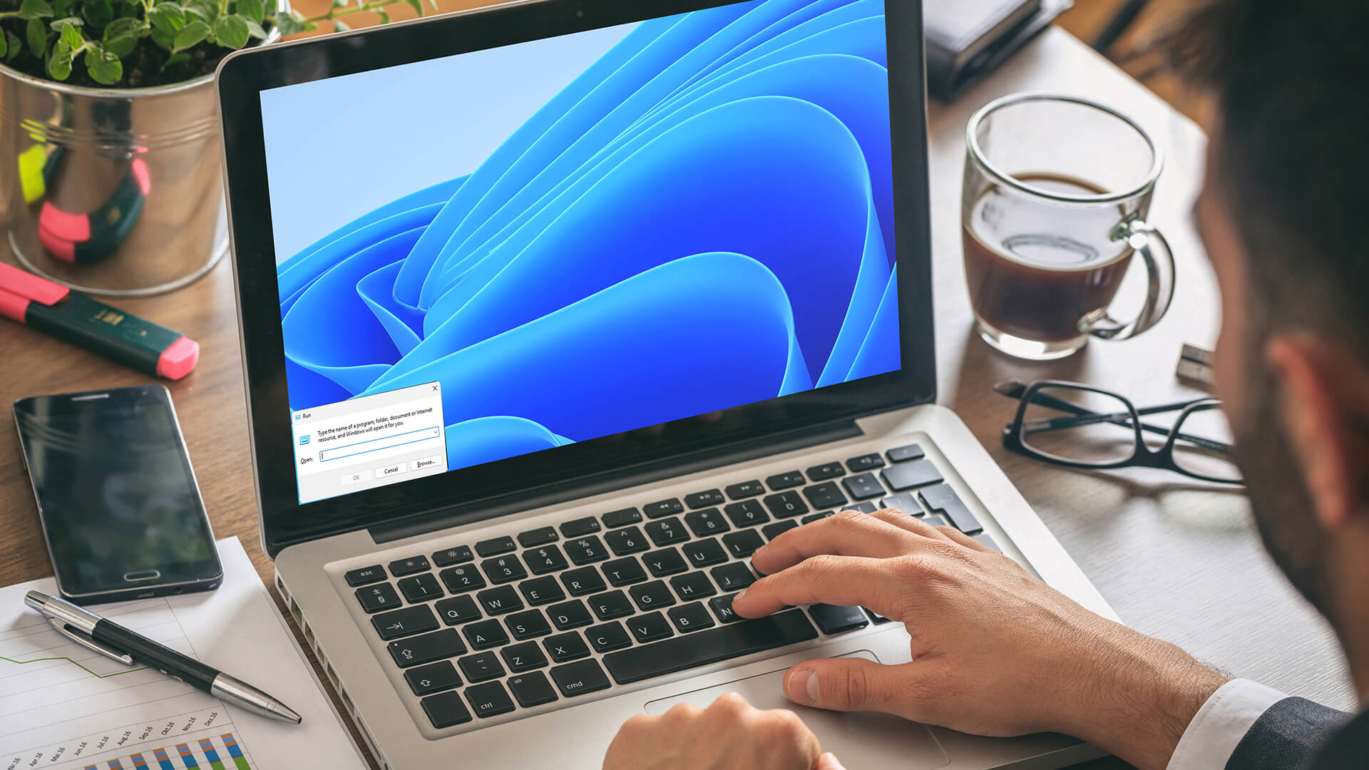 Laptop screen displaying the Windows Experience Index System Assessment Tool scores.